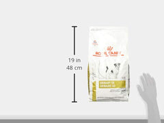 Royal Canin Urinary SO small-dog dry food bag with feeding guidelines for owners.