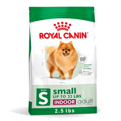 Royal Canin kibble close-up for small indoor dogs, palatable texture.