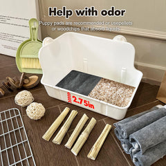 RubyHome litter box includes movable barrier to keep pets off mess.