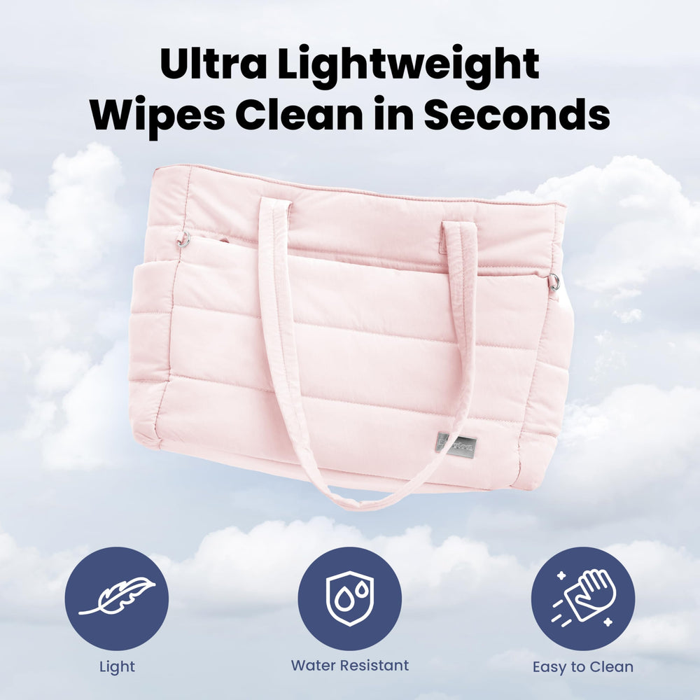 Rubyloo Puffer Dog Travel Bag in pink adds on-the-go style.