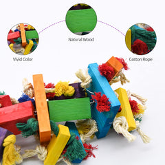 RubyQ parrot toy with natural wood and cotton for durability.