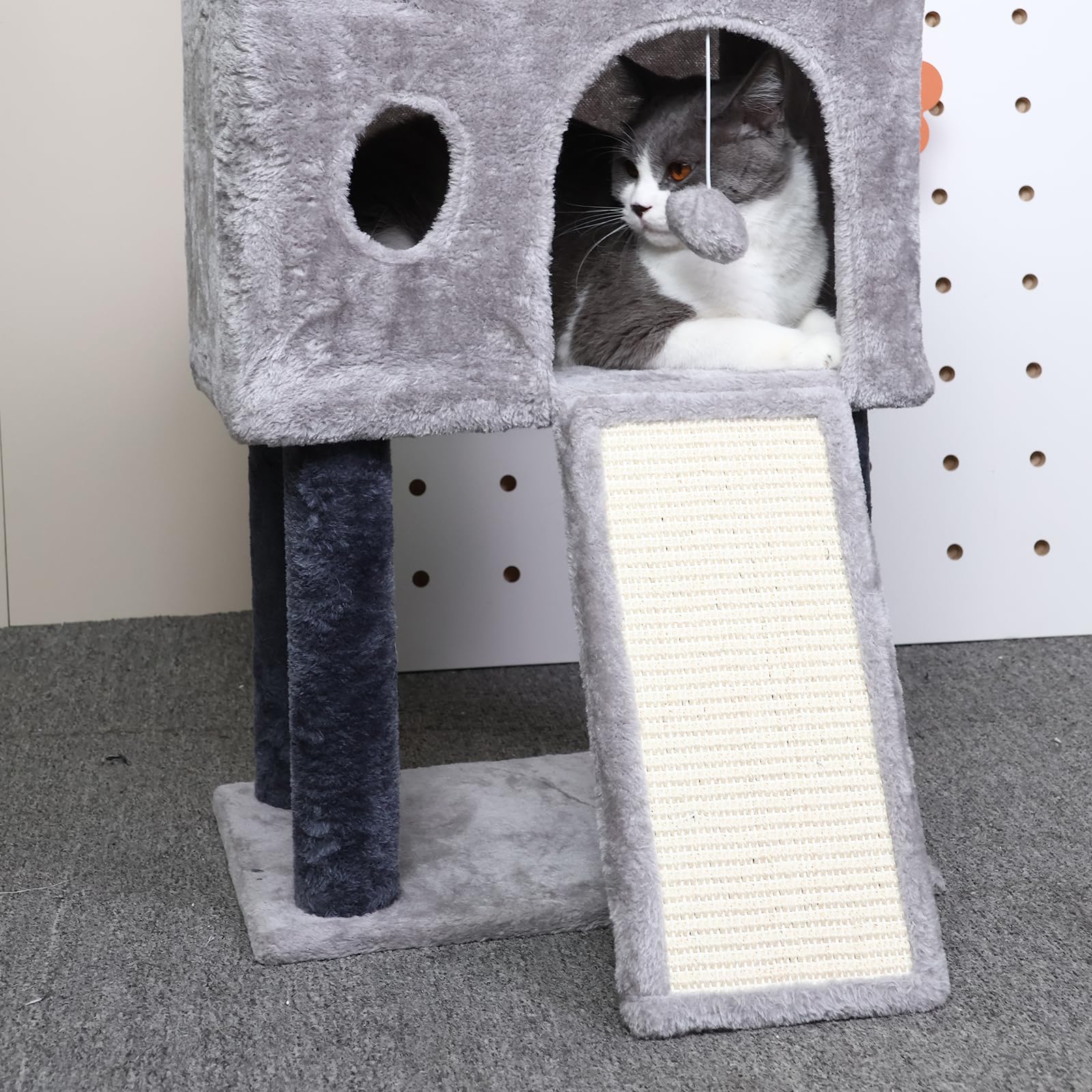 Runske 41-inch cat tree kitten cave and ball toys provide enrichment.