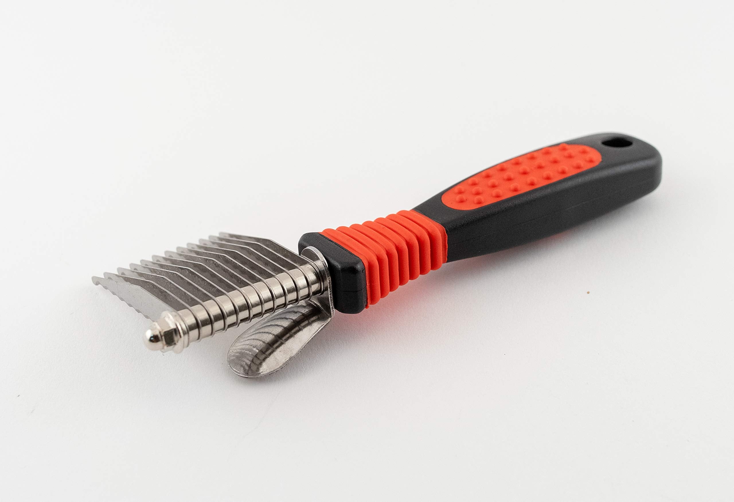 Close-up of the comfort grip on the Paw Brothers dematting tool for extended grooming