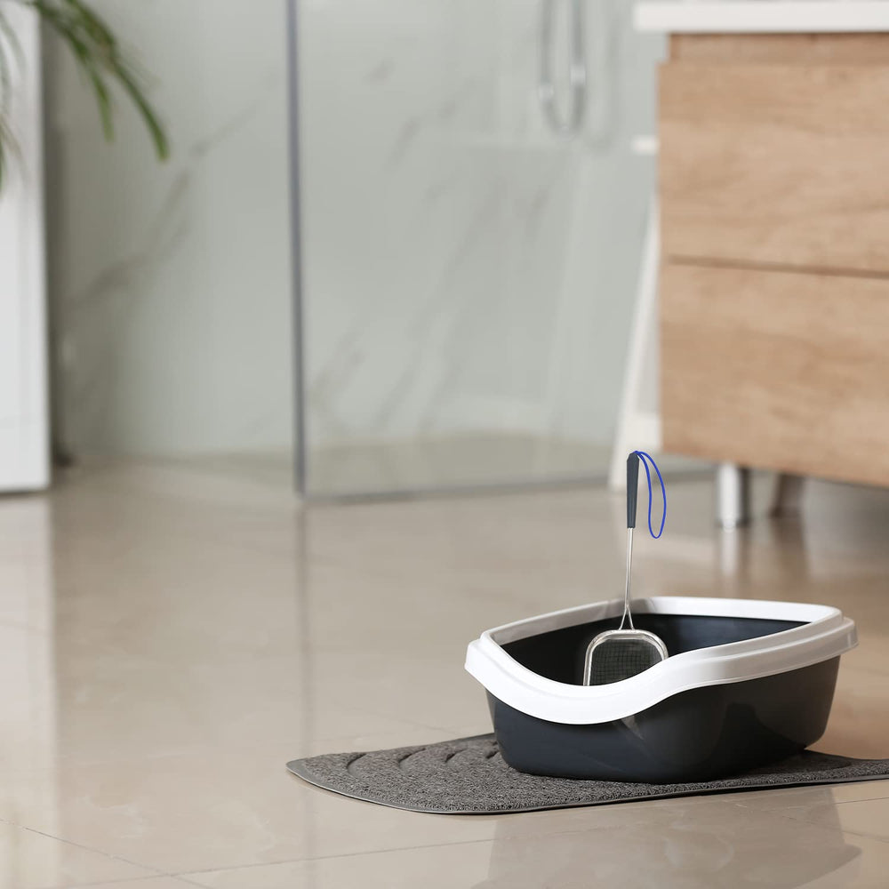 Sand Dipper metal scoop for quick litter box cleanup.