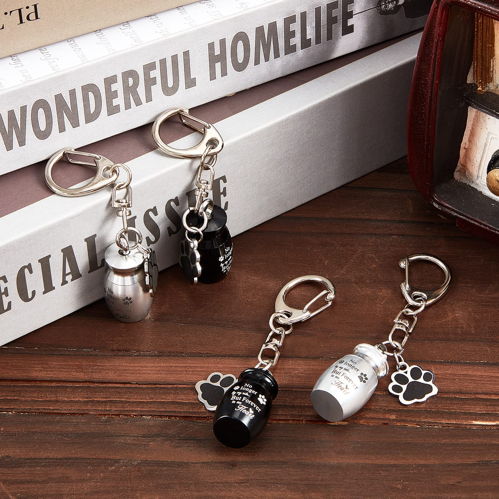 Sasylvia pet memorial keychain clipped to a backpack for easy access