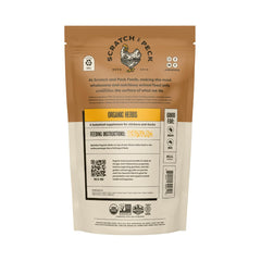 Scratch and Peck organic herb blend close up, supports digestion when sprinkled on feed.