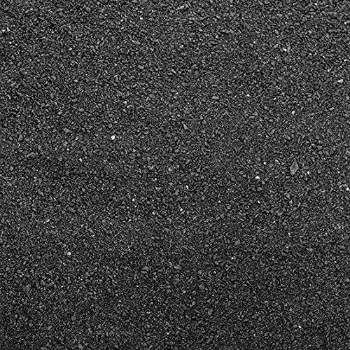 Seachem Fluorite Black Sand Substrate in an aquarium scene, enhances plant growth and deep color.