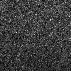 Seachem Fluorite Black Sand Substrate in an aquarium scene, enhances plant growth and deep color.