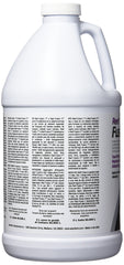 Seachem Reef Fusion 2 bottle beside a thriving coral display in a reef tank.