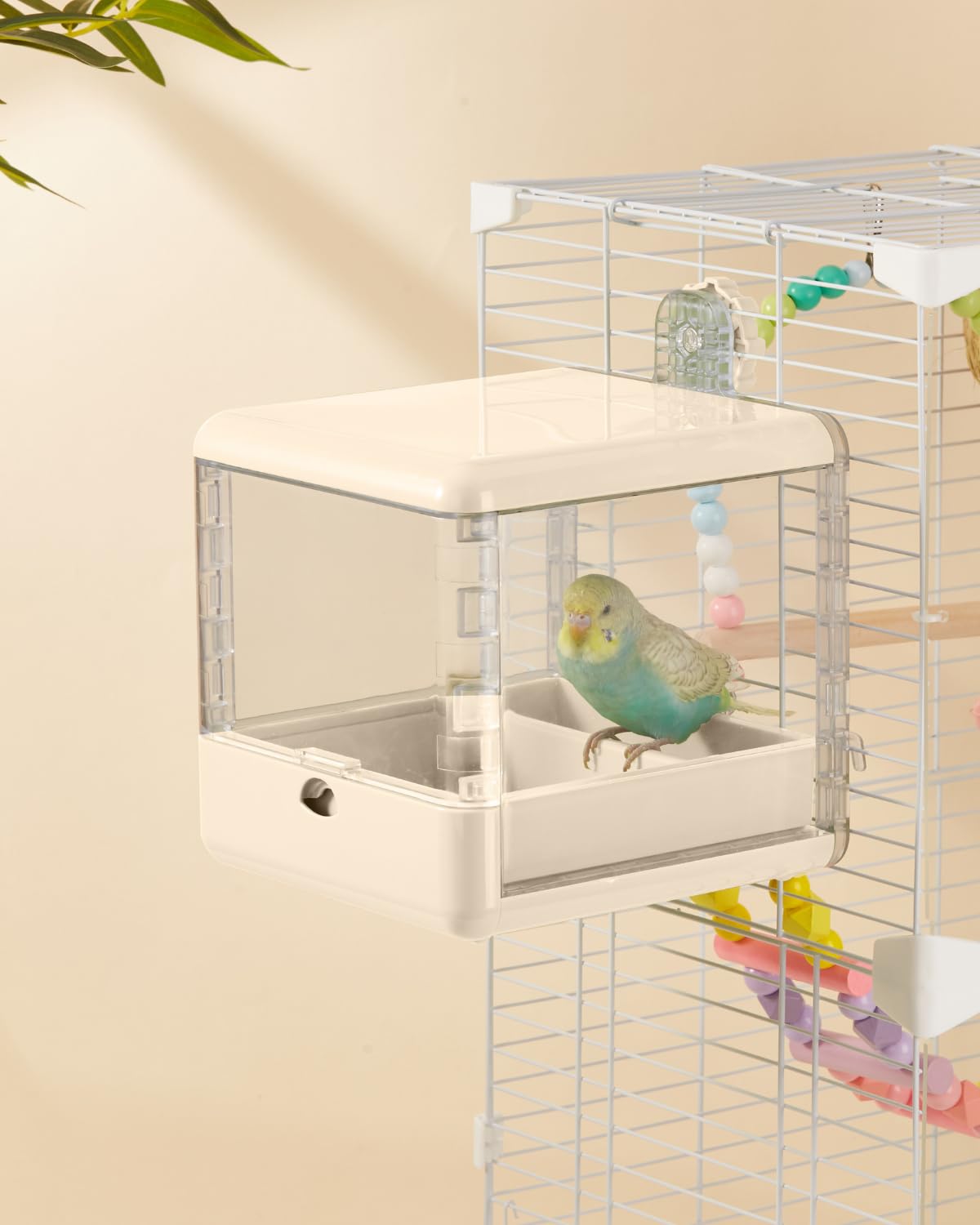 Septillar bird-feeder-bath-cage provides combined bathing and feeding for small birds.