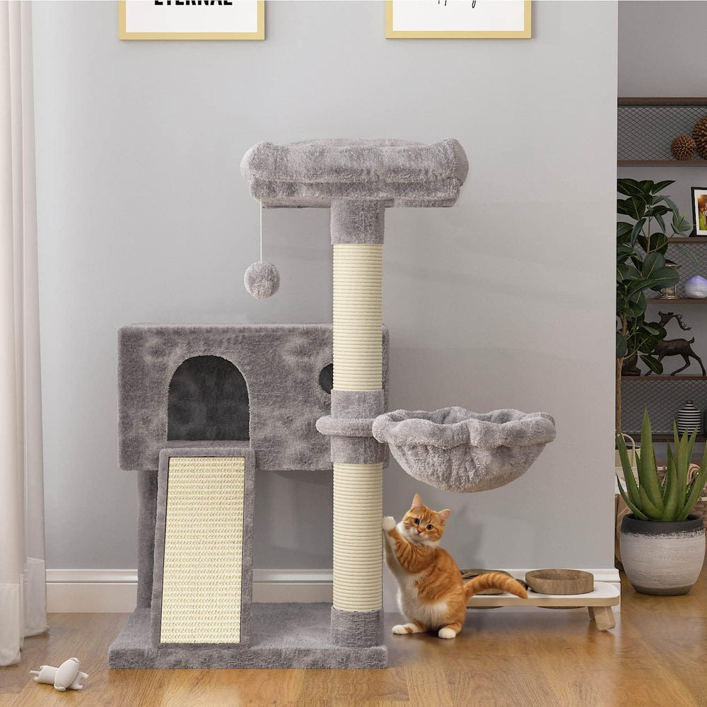 SHA CERLIN cat tree with sisal posts promotes healthy claws through satisfying scratching.