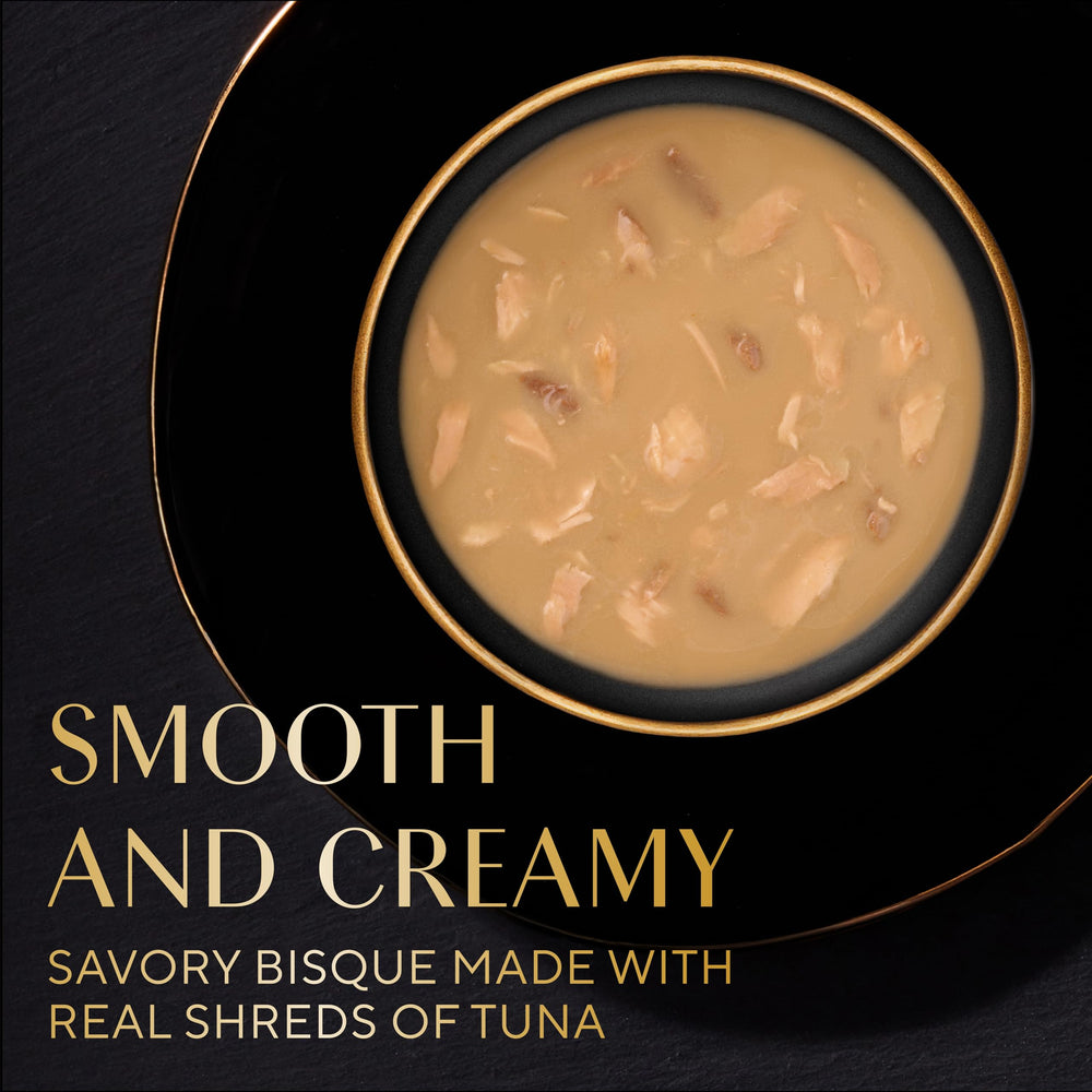 Close-up of tuna shreds in Sheba Bisque Lickable for appealing texture.