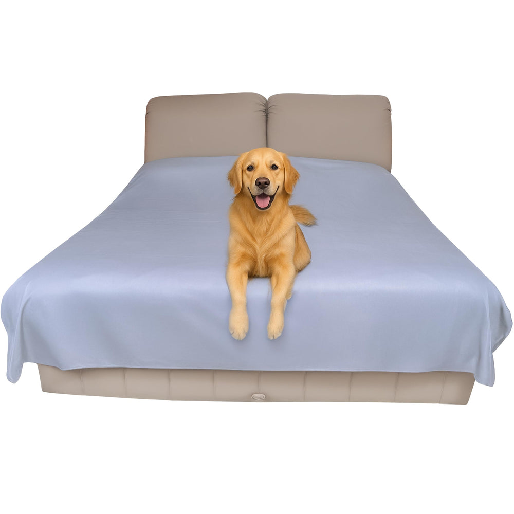 Silly Legacy thin reversible waterproof bed cover on a queen bed for full protection.