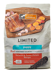 SIMPLY NOURISH Puppy Salmon and Sweet Potato dry kibble label front highlights limited ingredients.