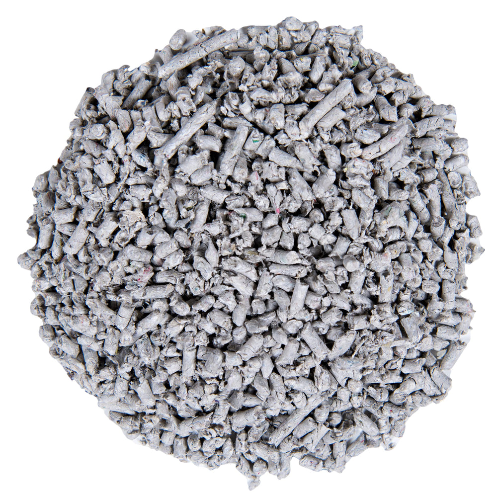 Small Pet Select litter pellets close-up texture highlighting uniform size.