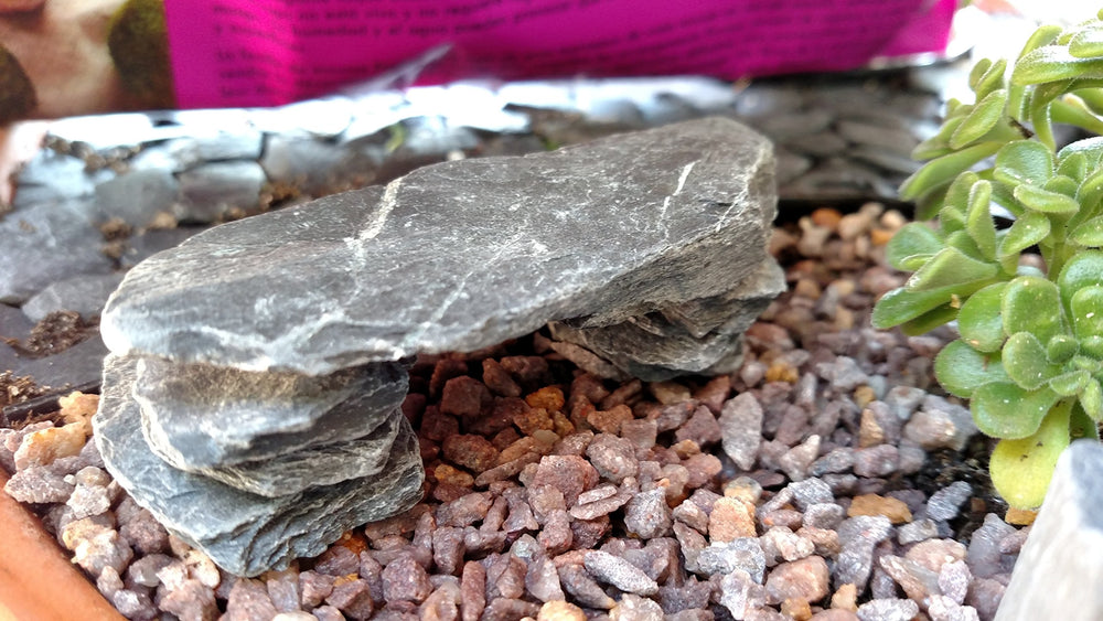 Small World Slate & Stone mosaic art tiles bring natural texture to artworks.