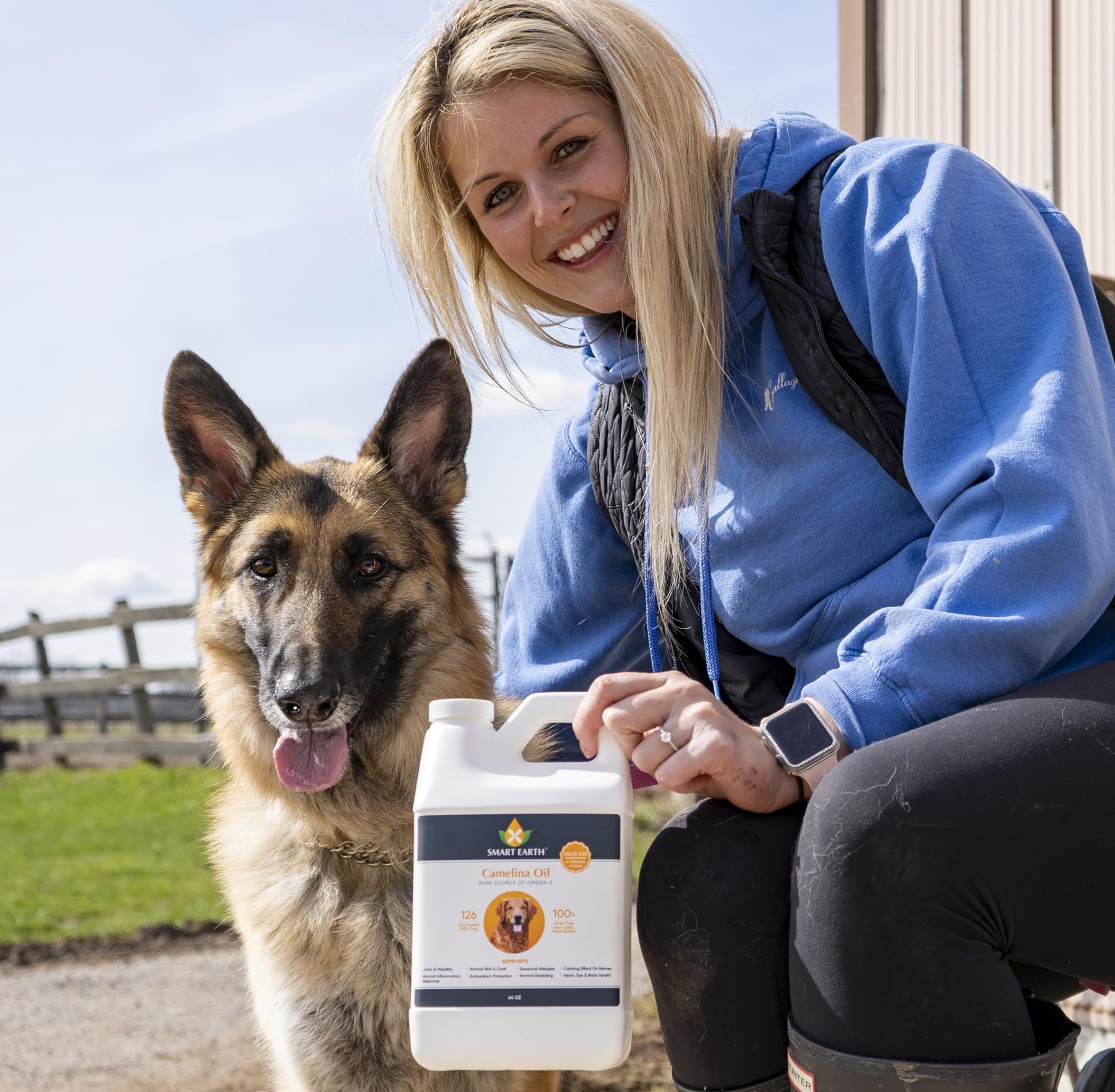 Smart Earth Camelina Oil for Dogs pouring onto meals during feeding.