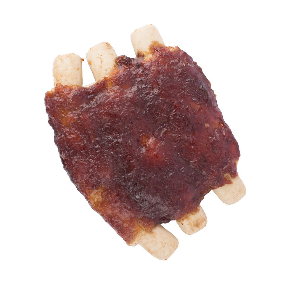 SmartBones rawhide-free chews close-up shows real chicken and pork flavors for tasty snacks.