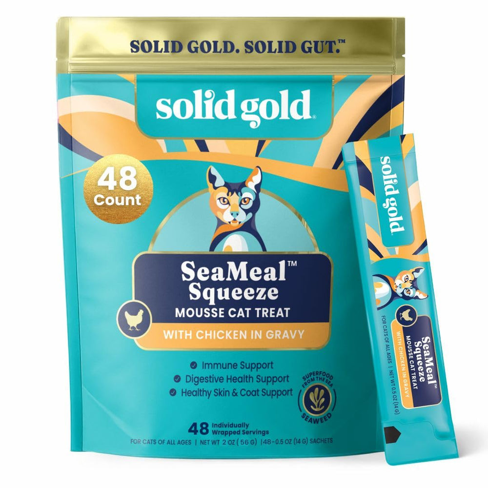 Solid Gold SeaMeal Squeeze chicken treat bottle highlights convenient, lickable feeding.