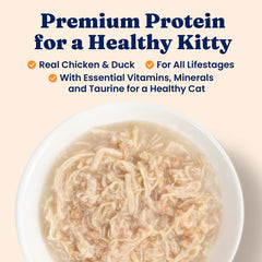 Solid Gold chicken and duck shreds in gravy close-up showing high-protein texture.