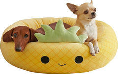 Squishmallows Maui Pineapple 24-inch pet bed with plush round design for cozy naps.