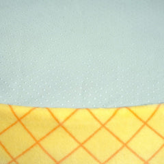 Squishmallows Maui Pineapple bolster edges showcase cushioned comfort and natural headrest.