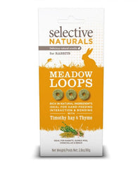 Close-up of Meadow Loops ingredients: Timothy Hay and Thyme for natural snacking