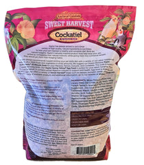 Sweet Harvest cockatiel seed mix closeup showing diverse ingredients and textures.