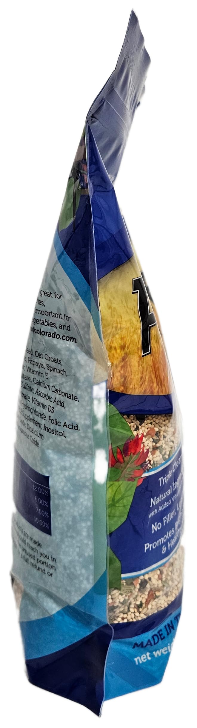 Sweet Harvest parakeet feeding scene with budgie and seed mix