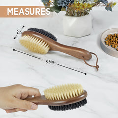 TAKAVU cat brush with stiff black bristles for dirt and loose hair removal.