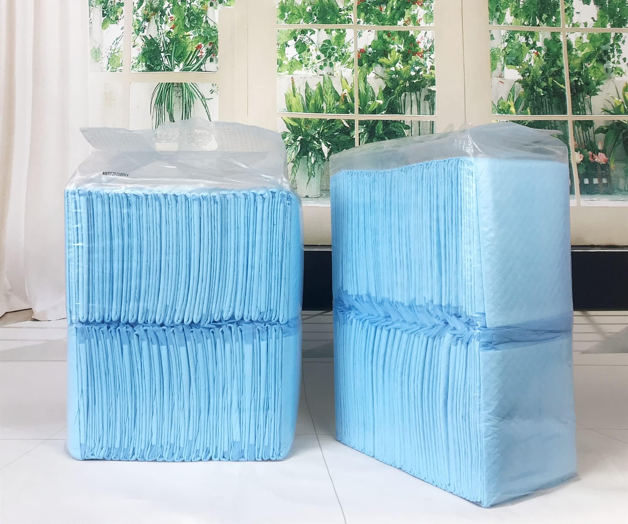 TBM quick-dry top layer keeps paws and floors dry.