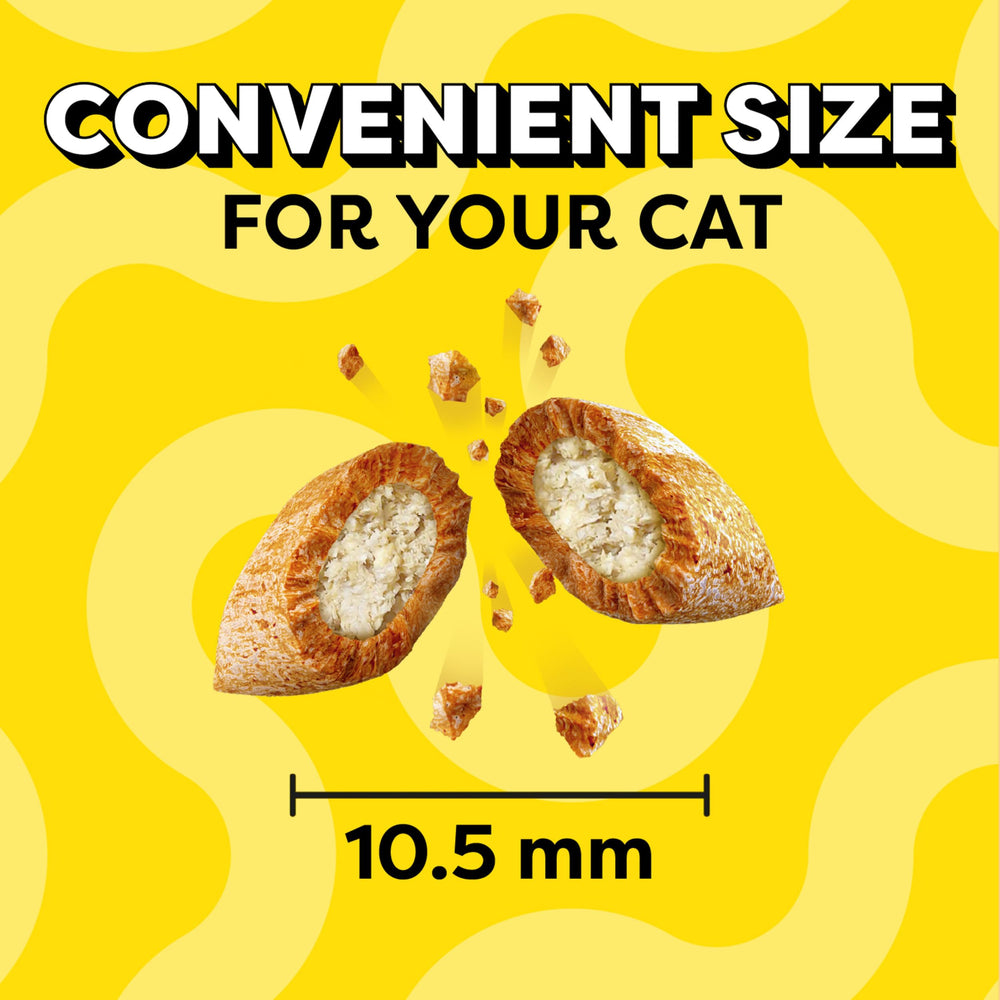 Serving-size Temptations cat treats in a calm presentation.