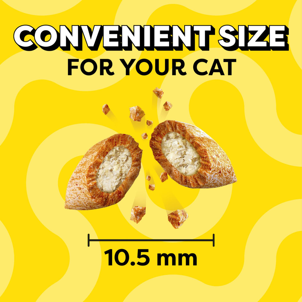 Temptations cat treats in a bowl for daily rewards.