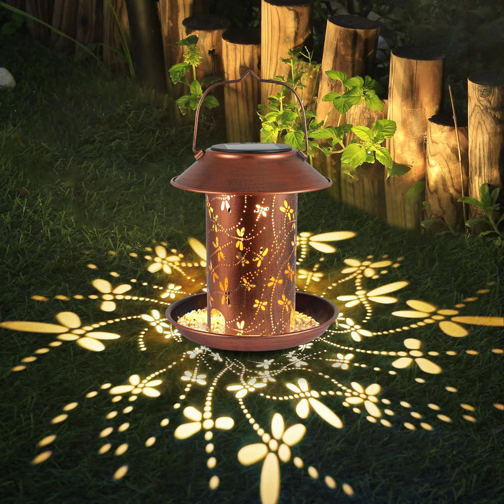 Tepaken dragonfly lantern bird feeder hanging from a tree enhances outdoor decor.