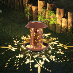 Tepaken dragonfly lantern bird feeder hanging from a tree enhances outdoor decor.