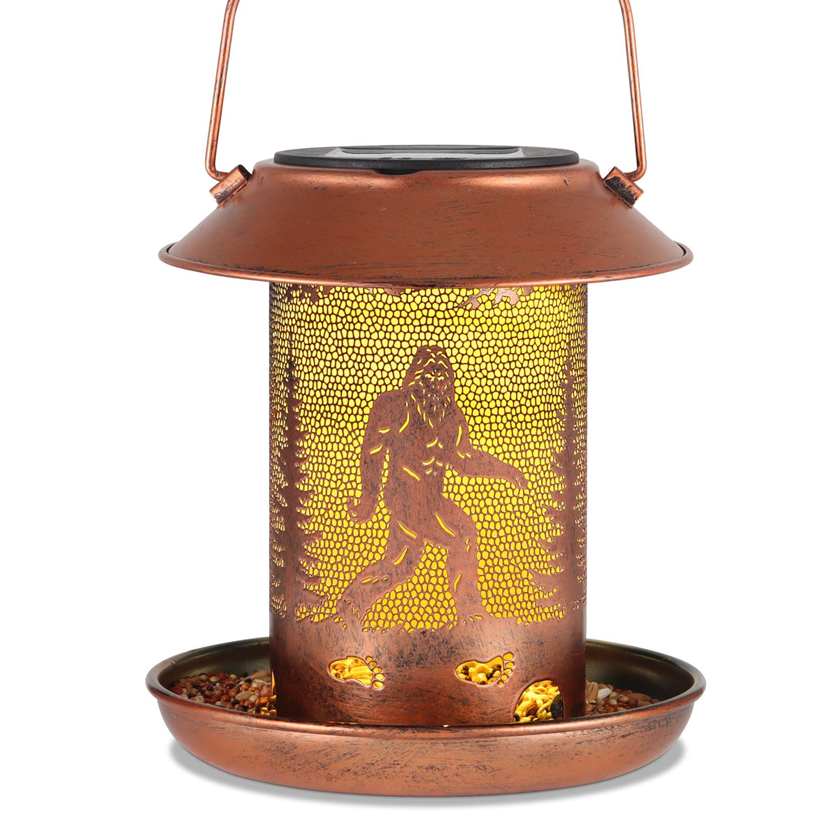Tepaken bird feeder sasquatch lantern on the ground invites birds and adds whimsical garden charm.