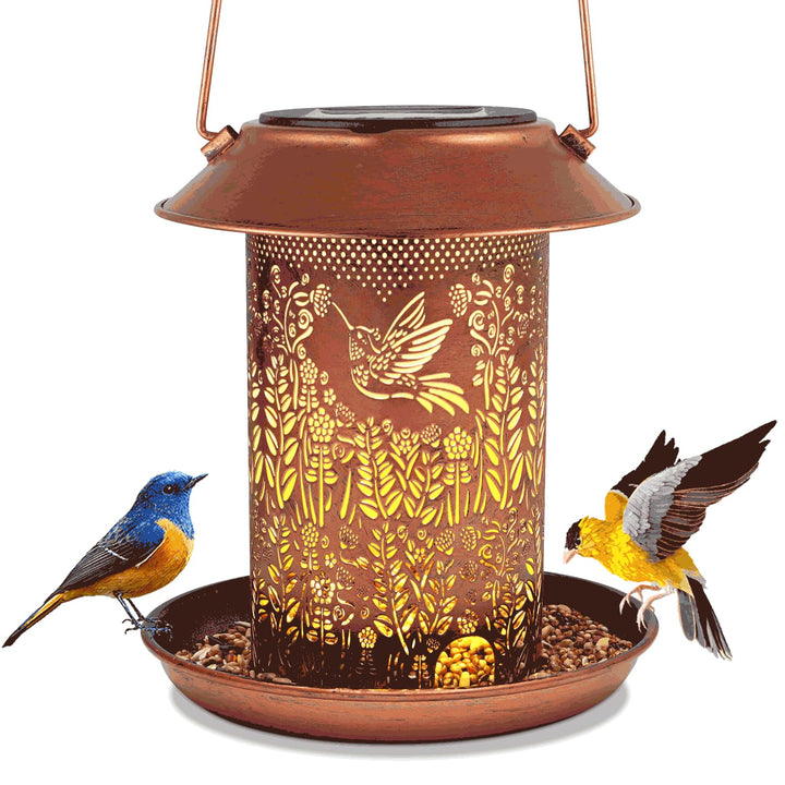 Tepaken outdoor bird feeder solar lantern in copper finish lights up gardens at night.