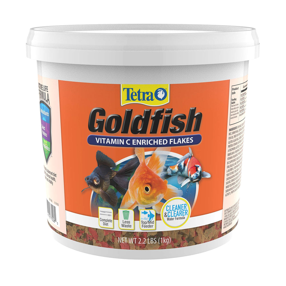 Tetra Goldfish Flakes bottle pour for easy feeding