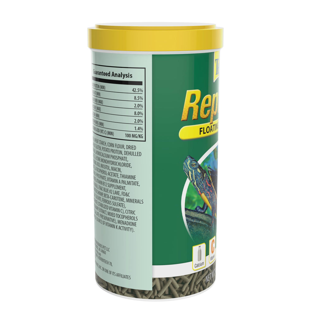 Tetra ReptoMin floating food sticks while turtles feed at the water surface.