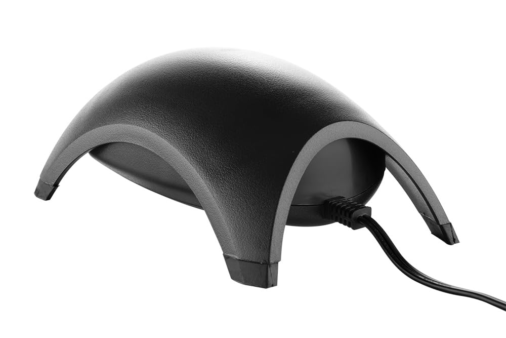 Tetra Whisper Air Pump in aquarium setup demonstrates easy integration with decor