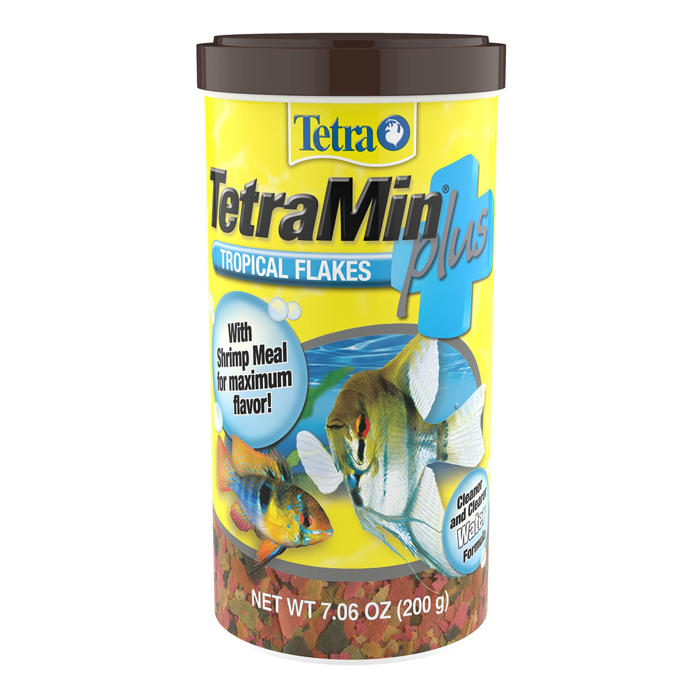 TetraMin Plus Tropical Flakes bottle-cap close-up for easy feeding in tropical tanks.