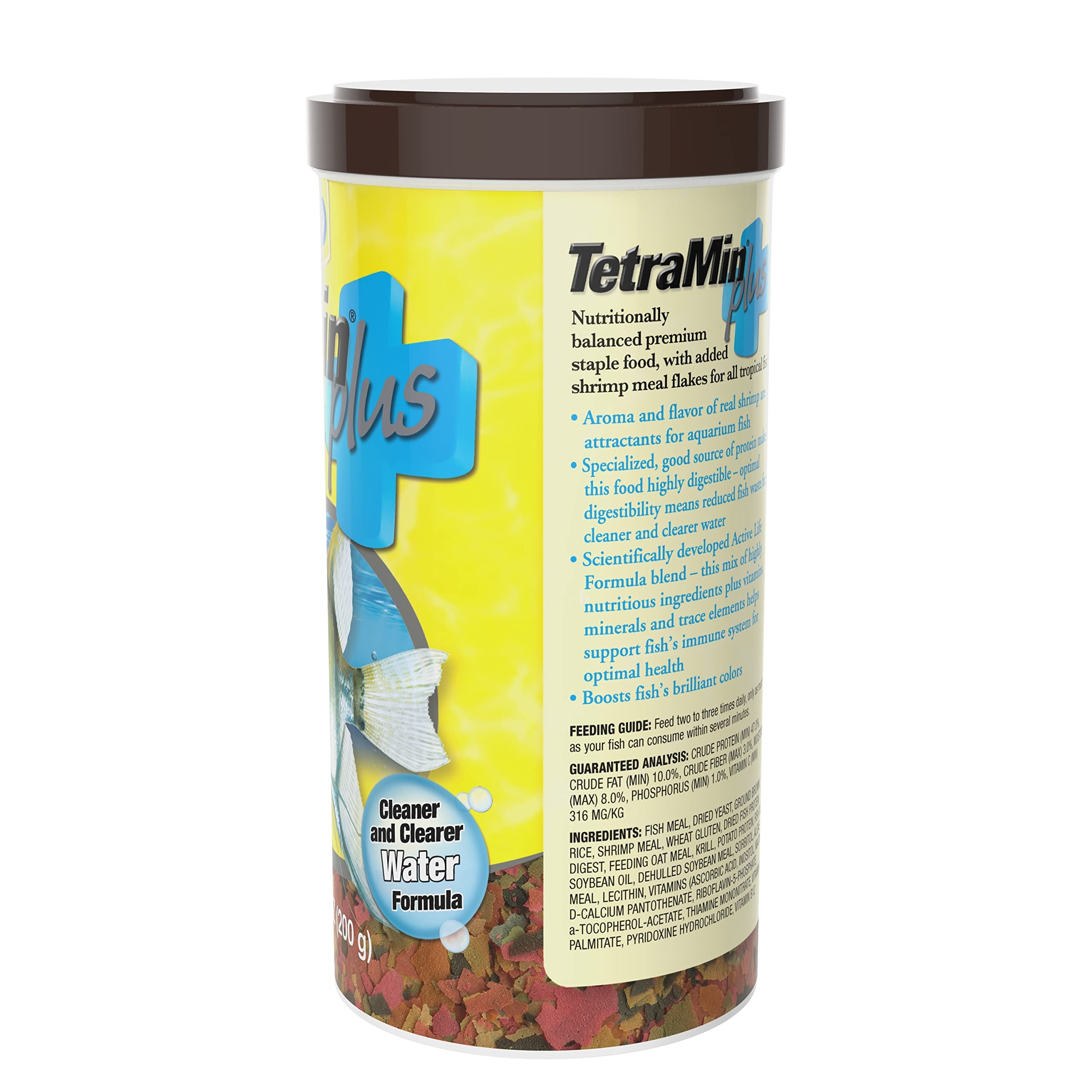 TetraMin Plus Tropical Flakes water-clarity demonstration in a clear tank.