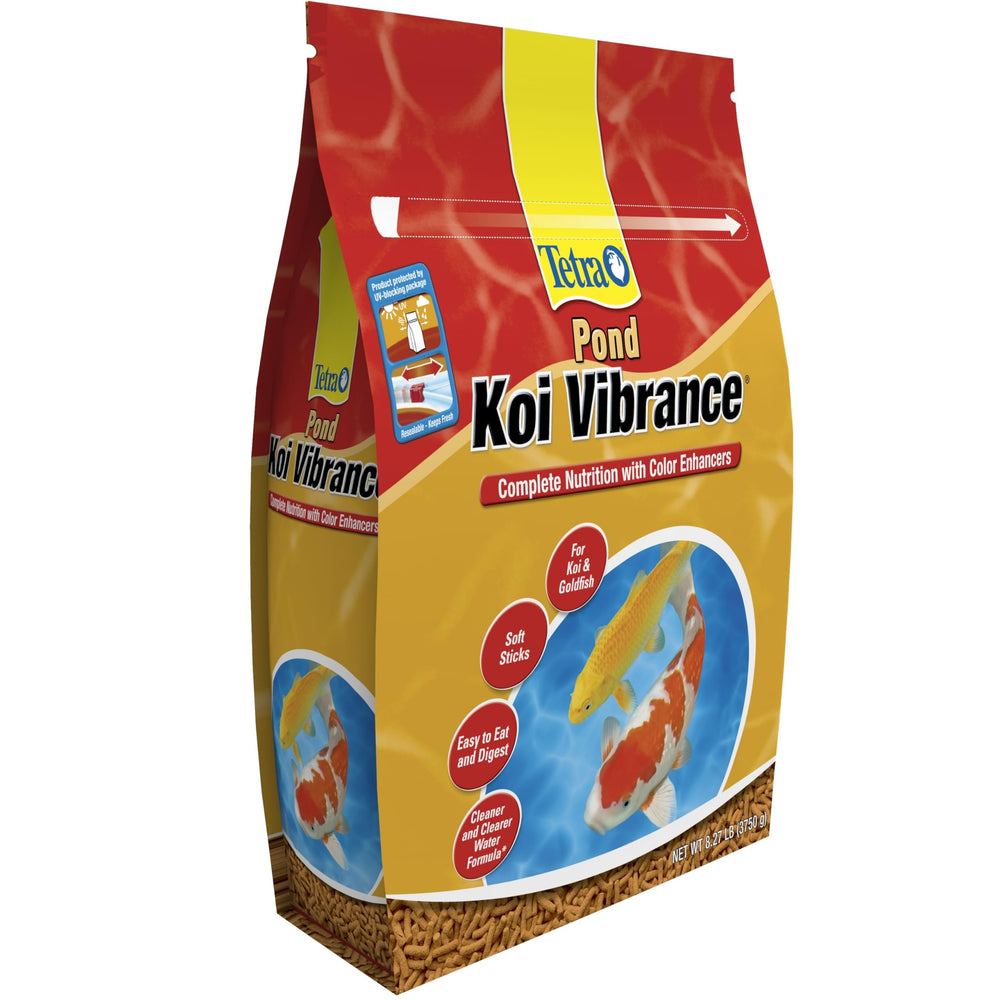 TetraPond Koi Vibrance soft sticks floating on water support healthy digestion.