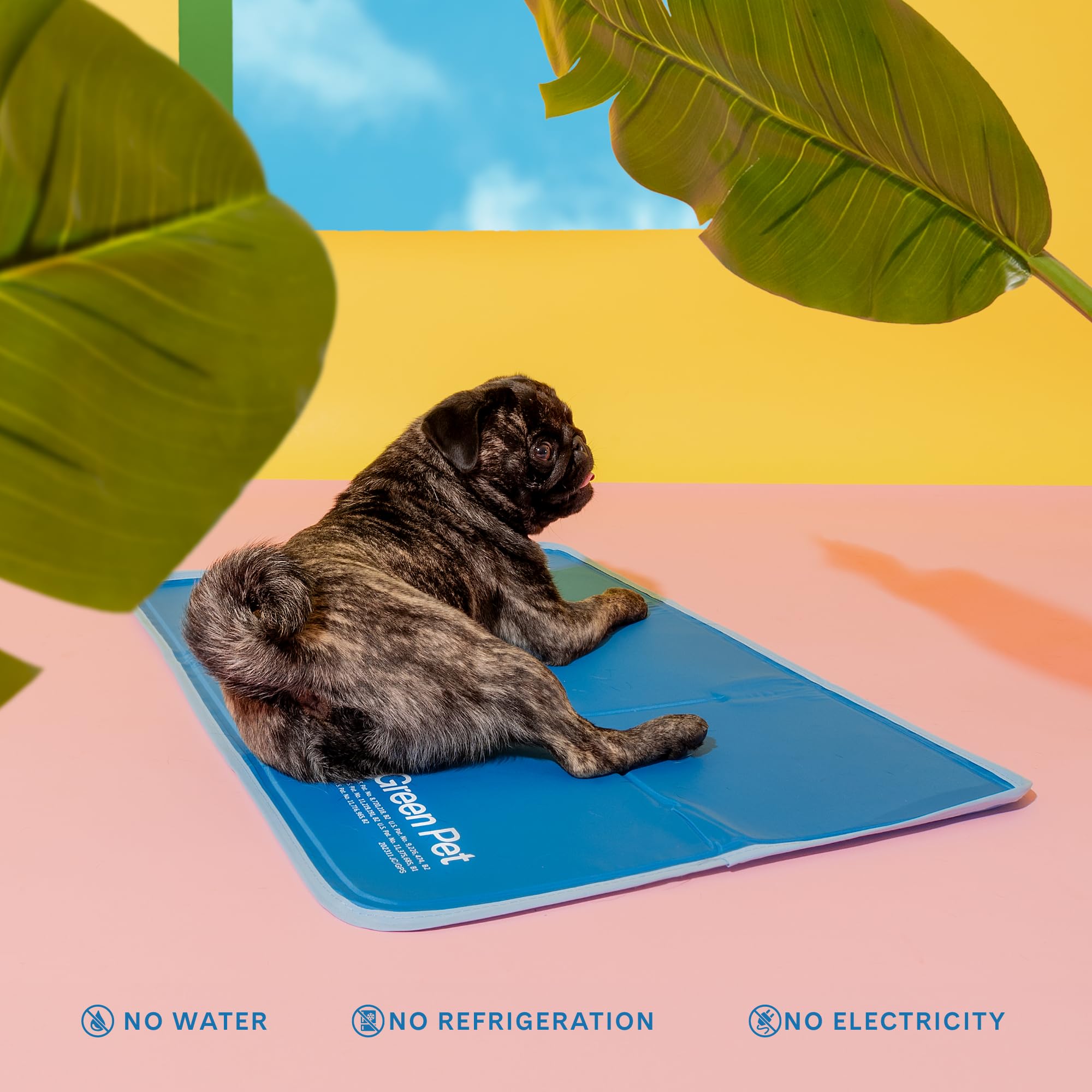 The Green Pet Shop Cool Pet Pad folded for travel fits into crates and car seats.