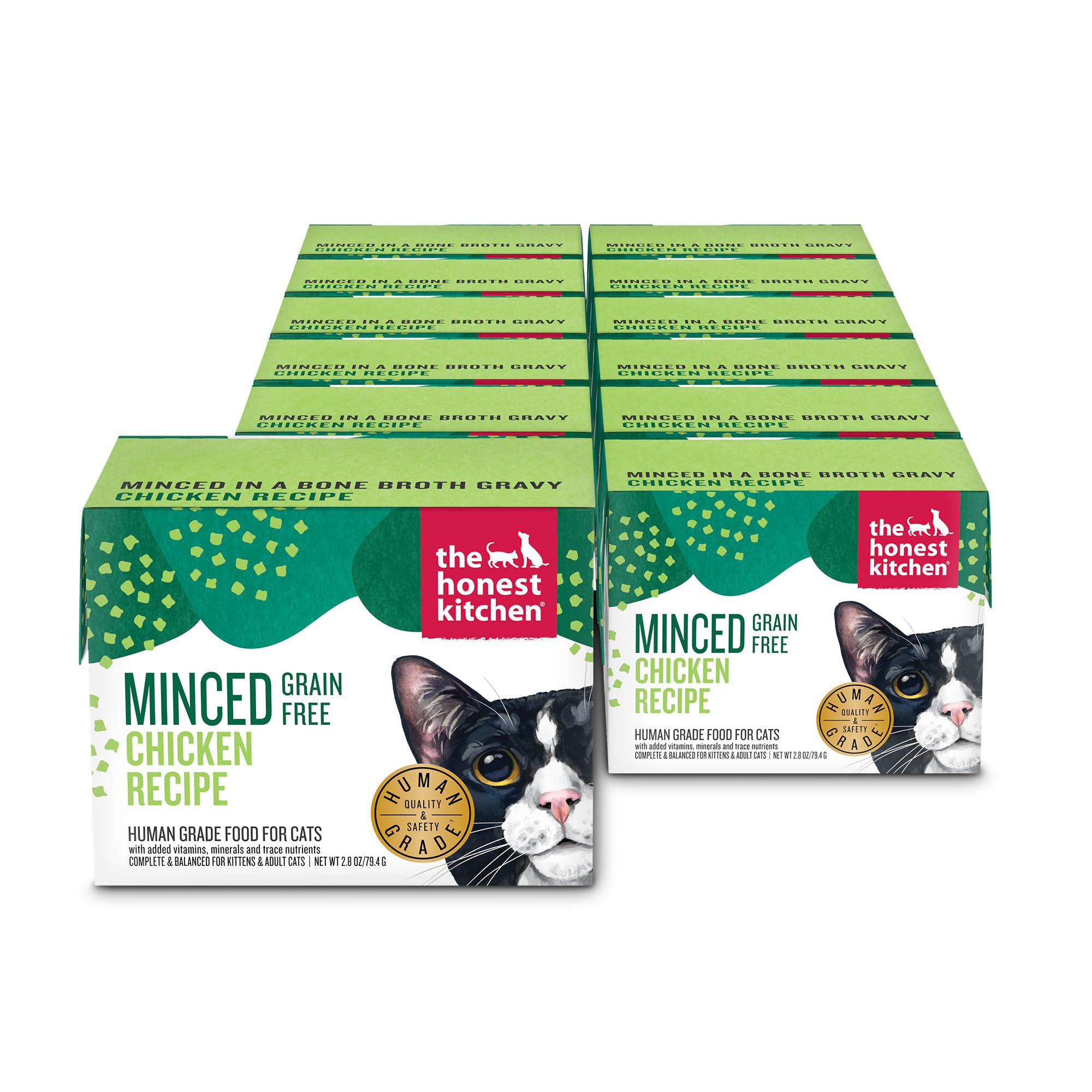 The Honest Kitchen minced chicken in bone broth gravy cat food in a serving bowl, grain-free and complete