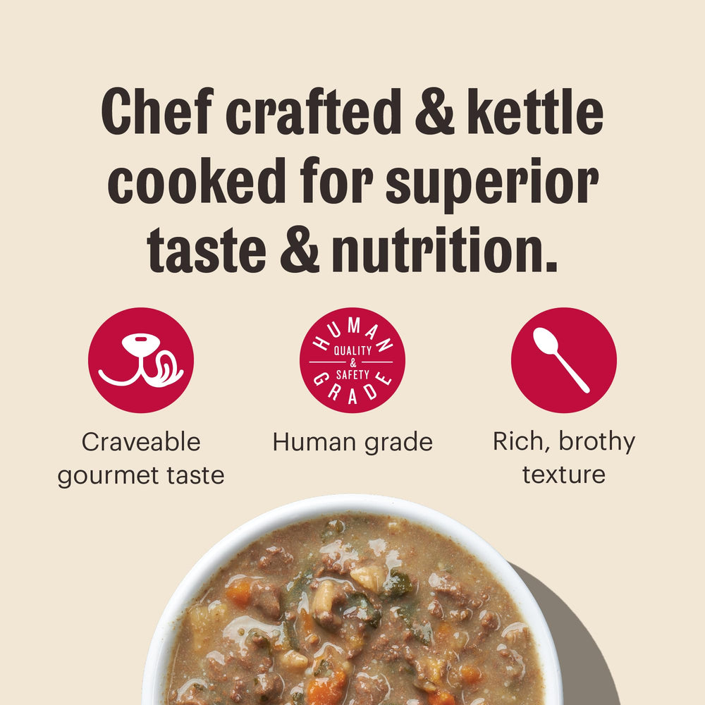 Ingredient display: cage-free chicken, salmon, broccoli, and greens in stew.