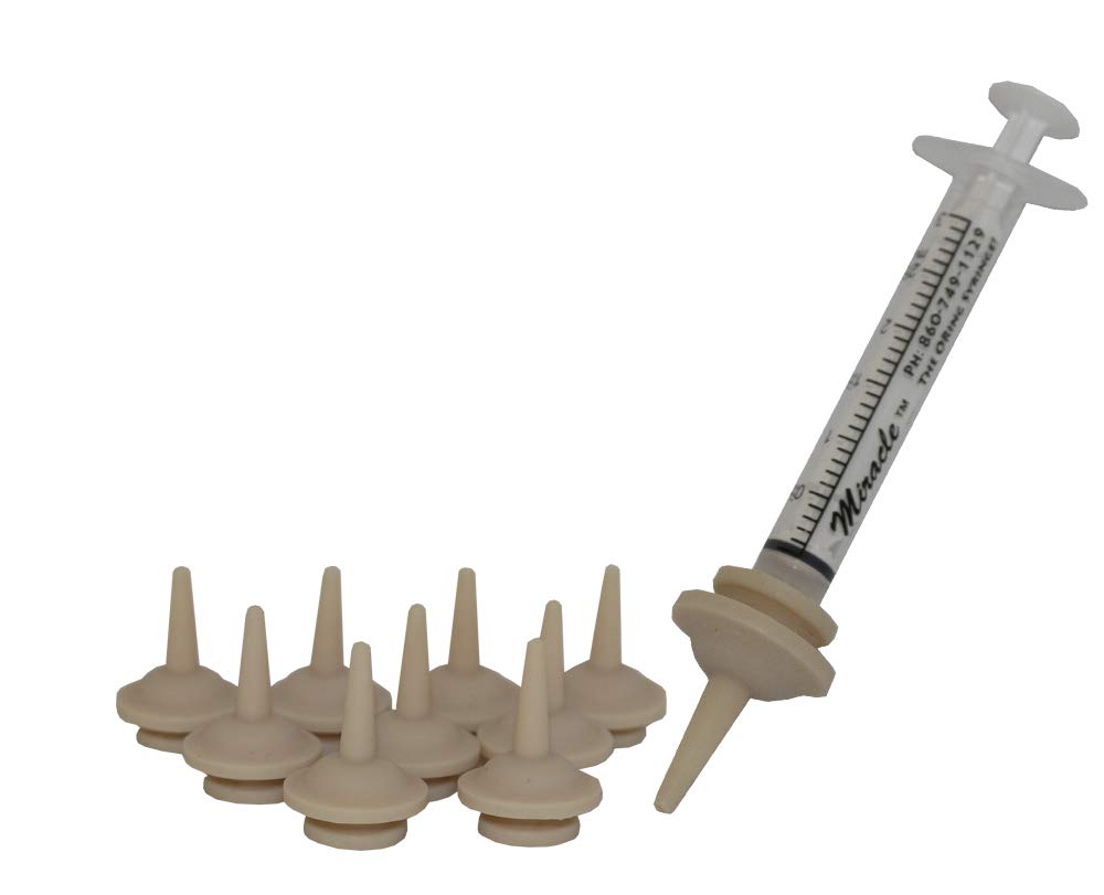 The Miracle Nipple pet feeding nipple with syringe supports gentle feeding for tiny mammals.