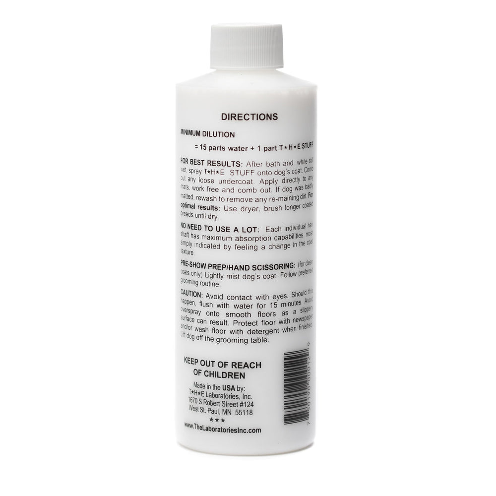 The Stuff detangler spray mist on fur for easier brushing and less matting.