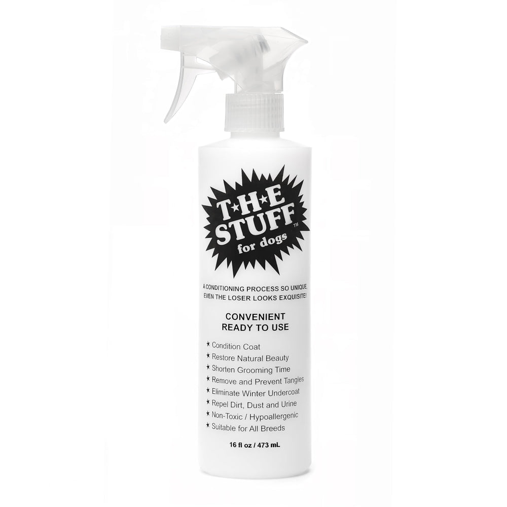 The Stuff Leave-in Dog Conditioner detangler bottle for smoother grooming and knot-free fur.
