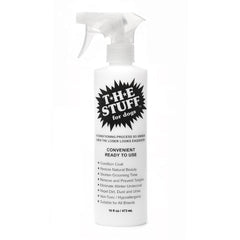 The Stuff Leave-in Dog Conditioner detangler bottle for smoother grooming and knot-free fur.